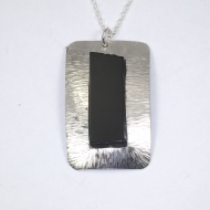 Silver and jet pendant
